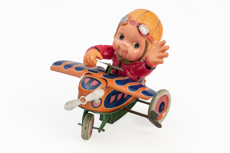 Child on a tricycle plane